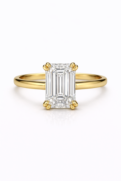 The Double Claw Emerald Cut Ring