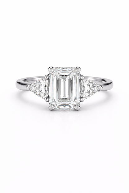 The Emerald Cut Three Stone Ring
