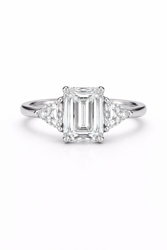 The Emerald Cut Three Stone Ring