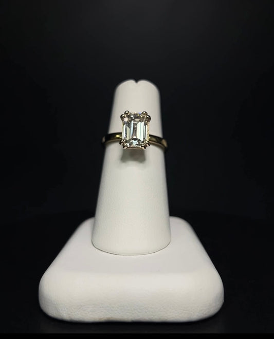 The Double Claw Emerald Cut Ring